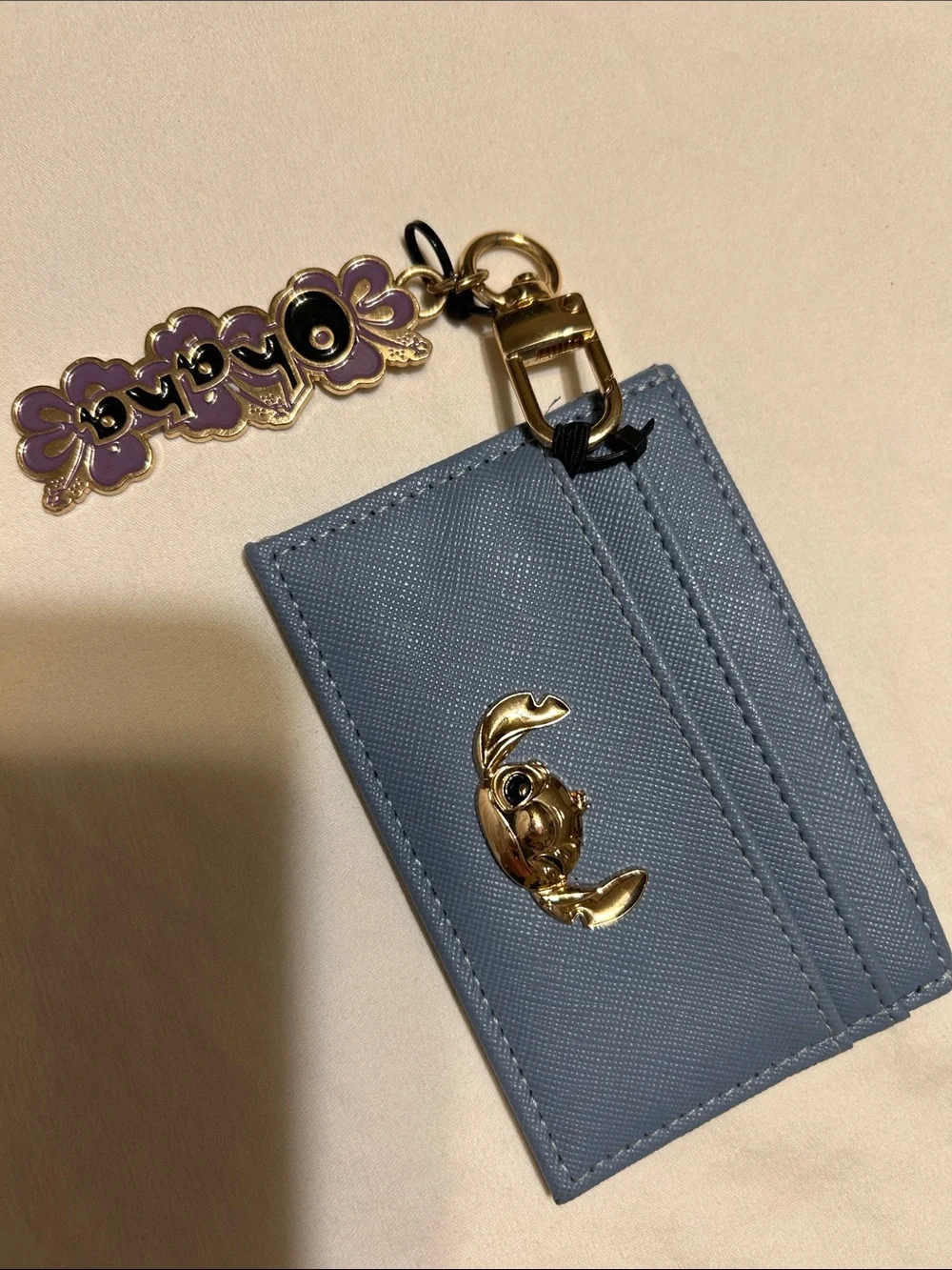 Disney Blue Card Holder Keychain with Gold Crab Charm and Purple Flower Tag